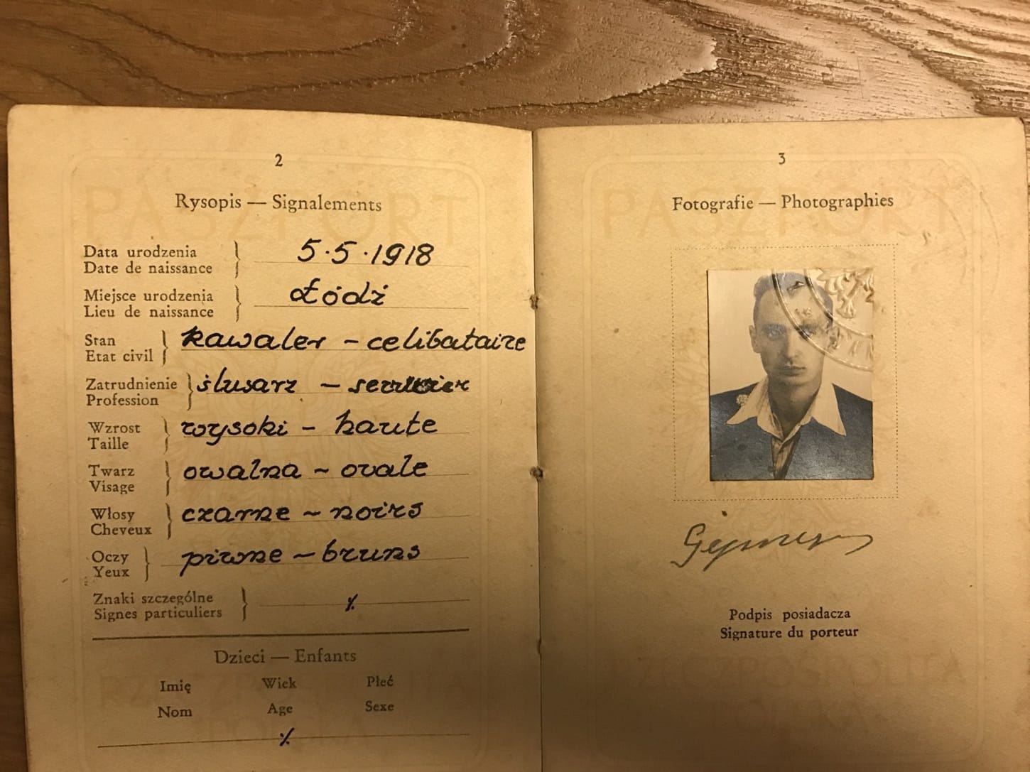 A third photograph of passport pages 2 and 3.